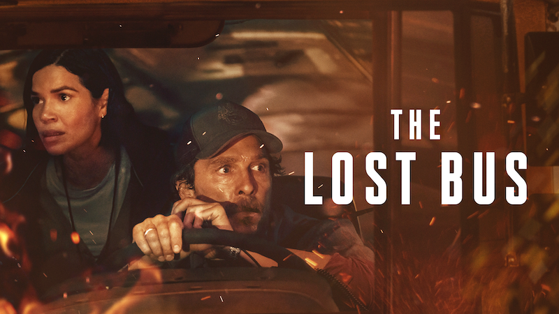 Matthew McConaughey at the wheel of The Lost Bus with America Ferrera standing next to him.